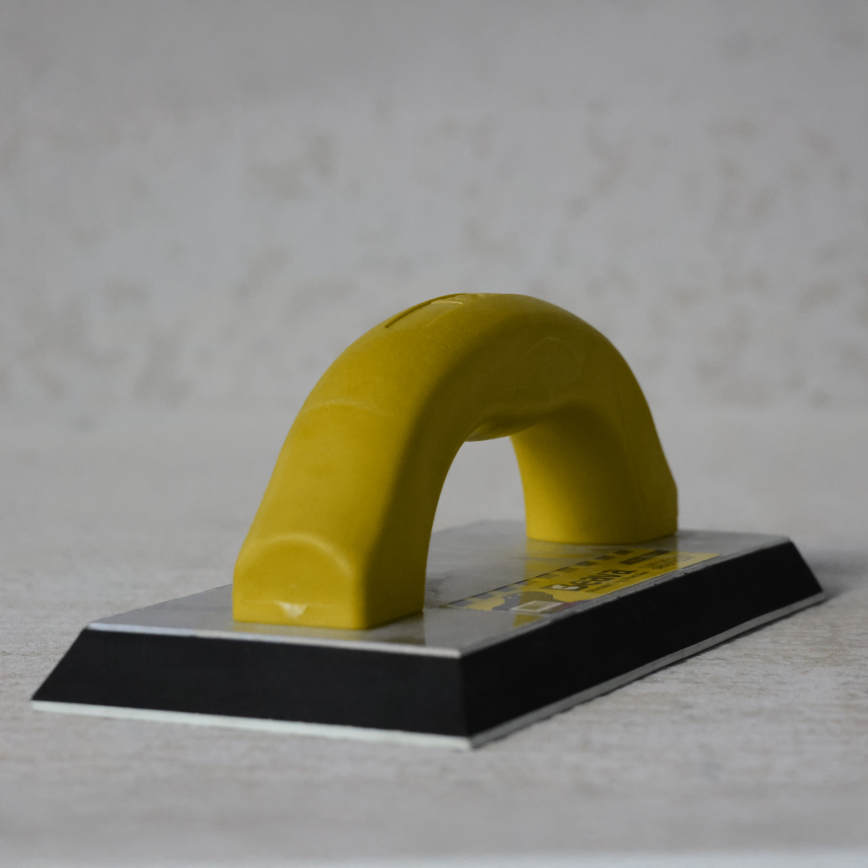 Beava Grout Float (yellow handle close up)